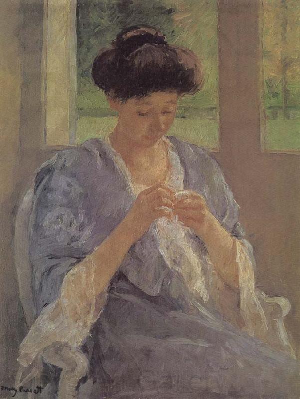 Mary Cassatt lady is sewing in front of the window